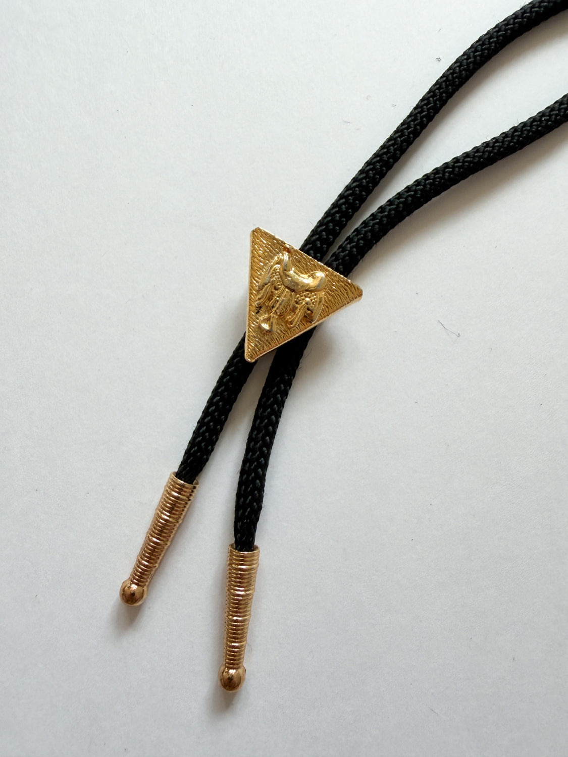 1970s Vintage Golden Saddle Triangle Bolo Tie