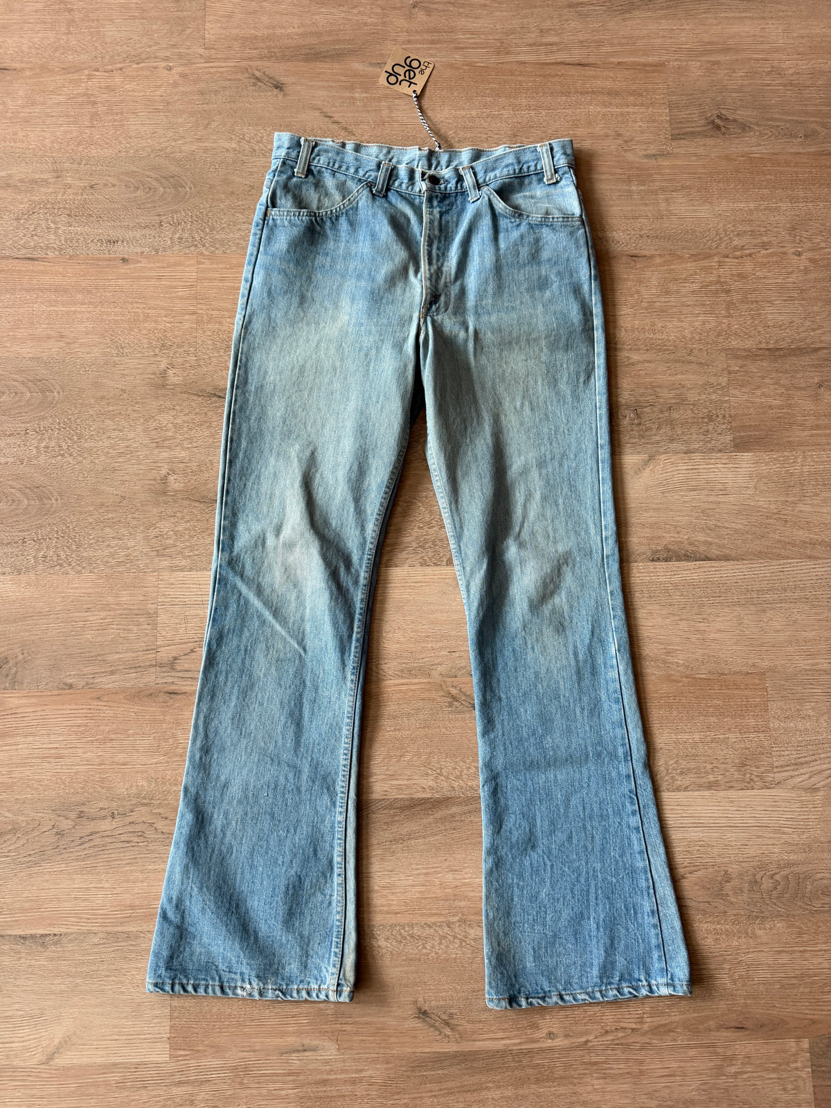 1970s Vintage Orange Tab Light Wash Levi's Jeans - 34" x 34"