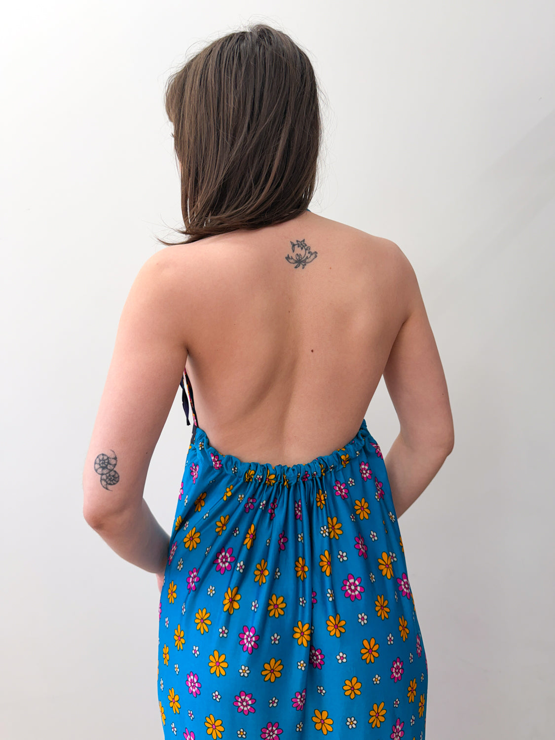 1970s Vintage Flower Power Backless Halter Maxi Dress The Getup Vintage 1970s Vintage Flower Power Backless Halter Maxi Dress The Getup Vintage