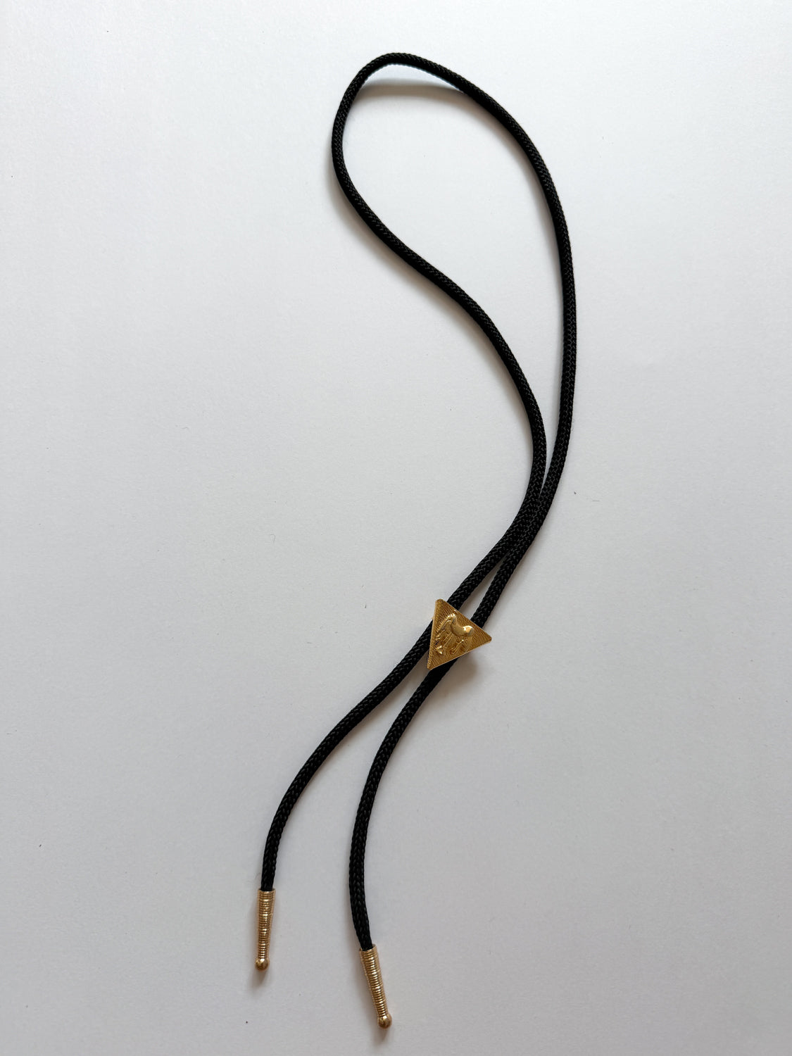 1970s Vintage Golden Saddle Triangle Bolo Tie