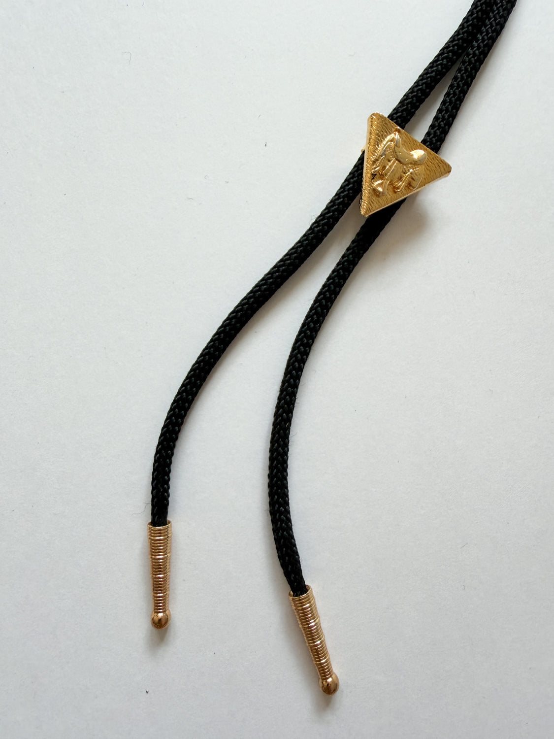 1970s Vintage Golden Saddle Triangle Bolo Tie