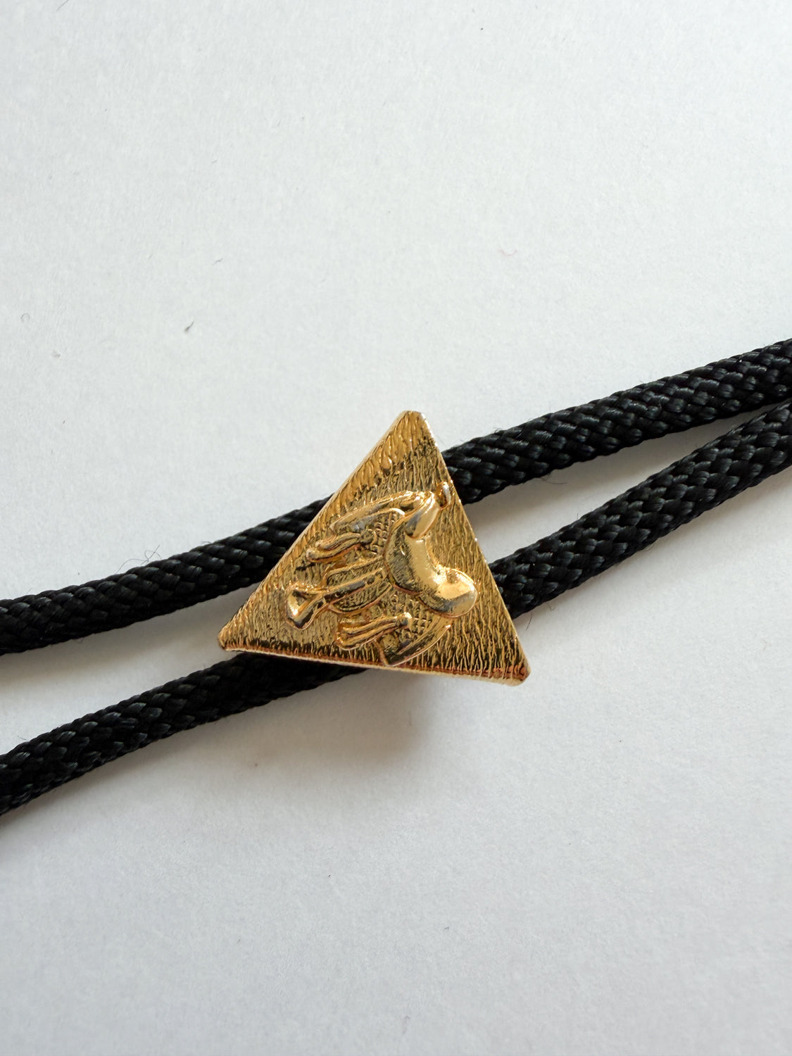 1970s Vintage Golden Saddle Triangle Bolo Tie