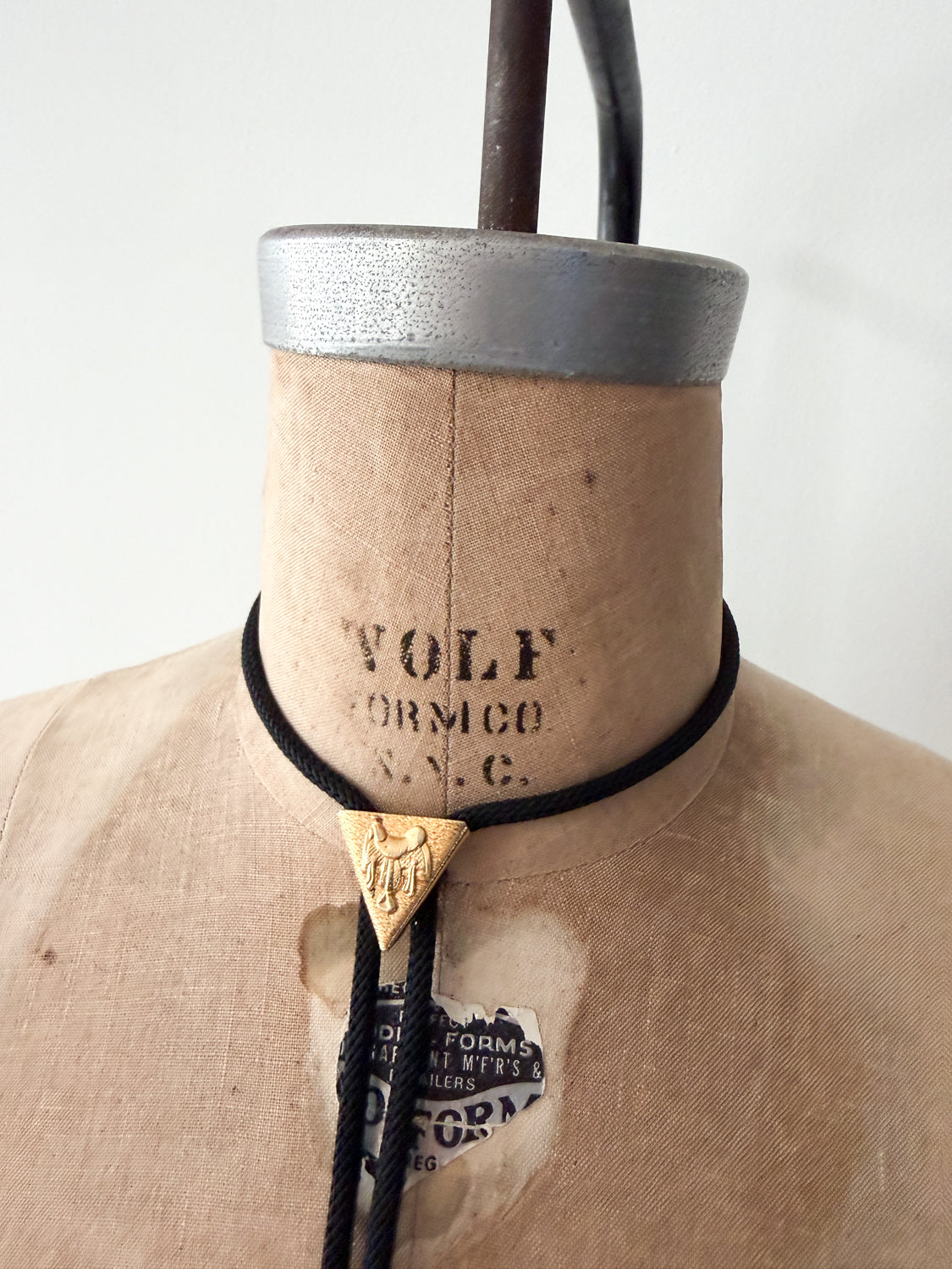 1970s Vintage Golden Saddle Triangle Bolo Tie