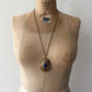 1980s Vintage Gold Swirling Blue Cabochon "Yesteryear Future Locket" by Avon
